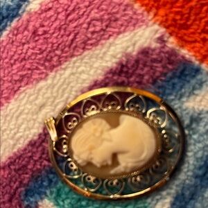 Elegant Gold and Cream Cameo Brooch